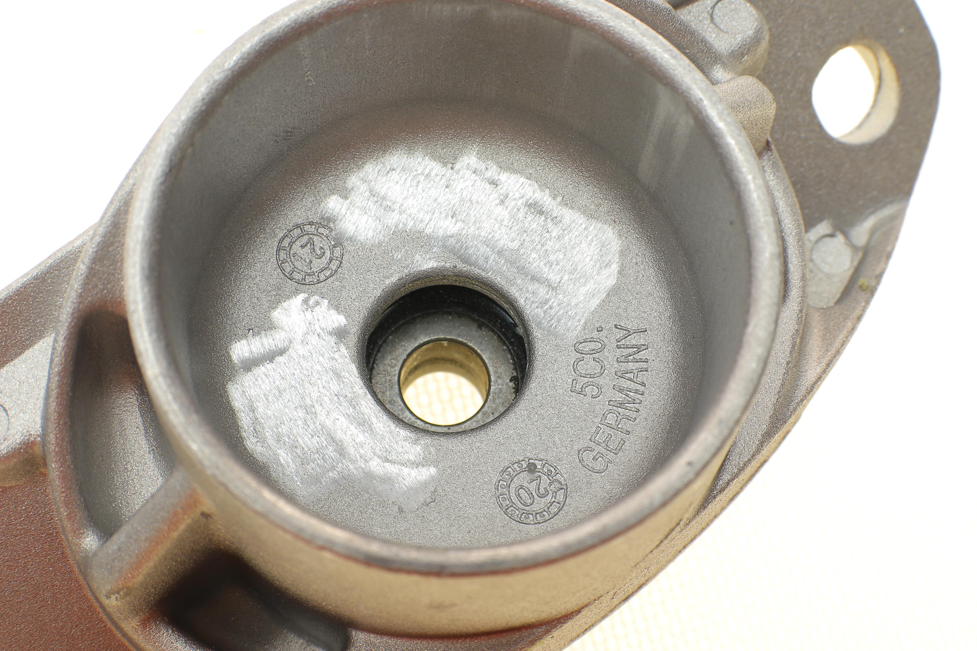 Подушка амортизатора (заднього) Audi A3/Seat Leon/ToledoIII/VW Golf/Jetta/Passat/Sharan/Tiguan 05-