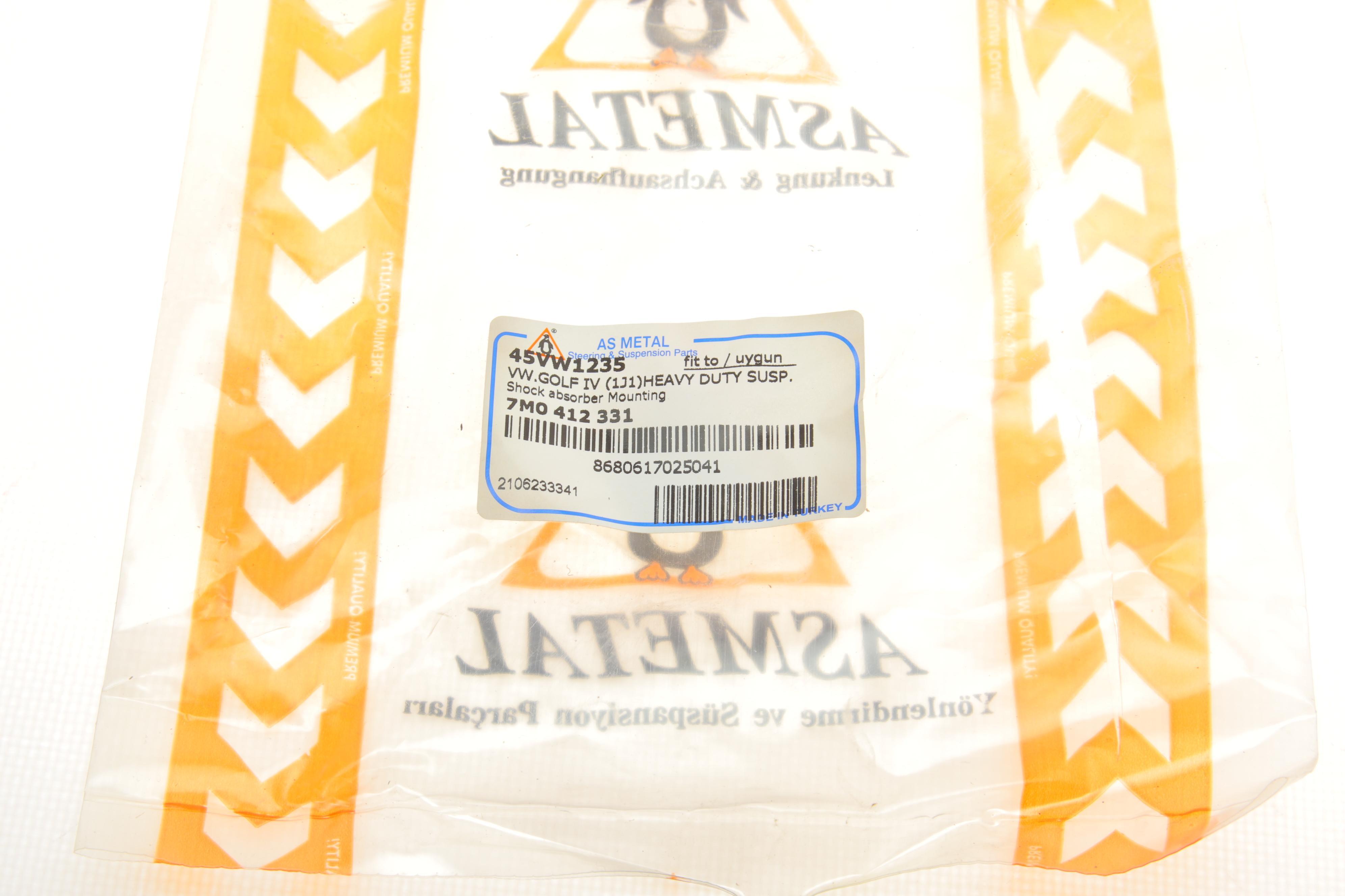 Подушка амортизатора (переднього) VW Caddy II -03