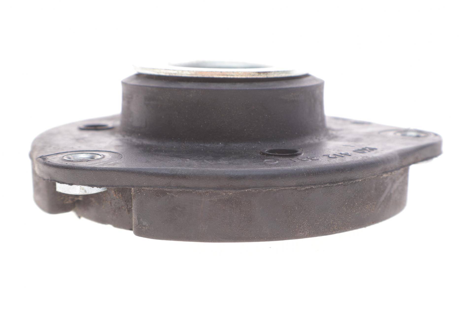 Подушка амортизатора (переднього) VW Caddy III 03- (всередині ОЕ)