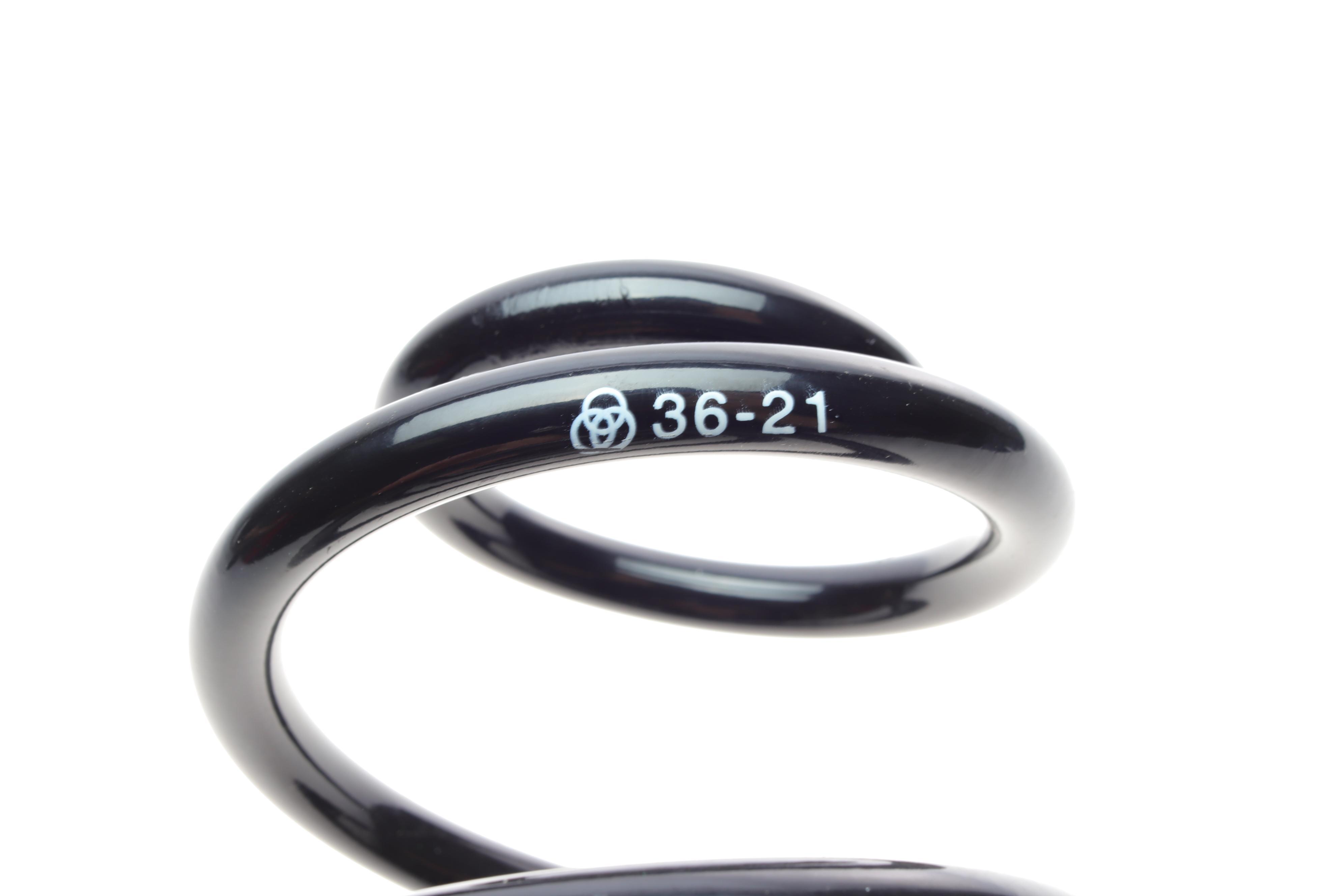 Пружина (задня) Skoda Octavia II 1.2-1.8TSI/1.6-2.0TDI 04-13/VW Jetta IV 10- (OE VAG)