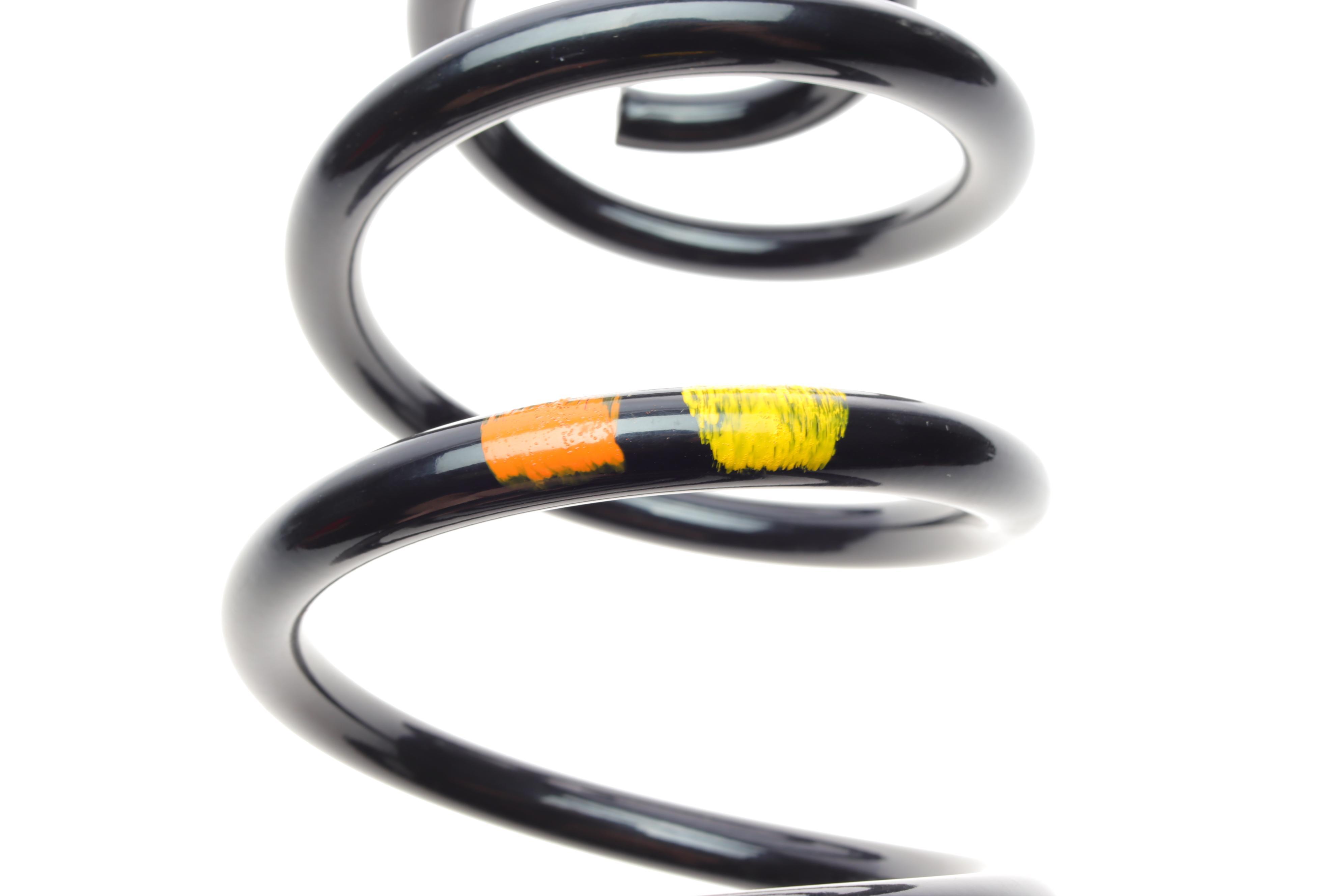 Пружина (задня) Skoda Octavia II 1.2-1.8TSI/1.6-2.0TDI 04-13/VW Jetta IV 10- (OE VAG)