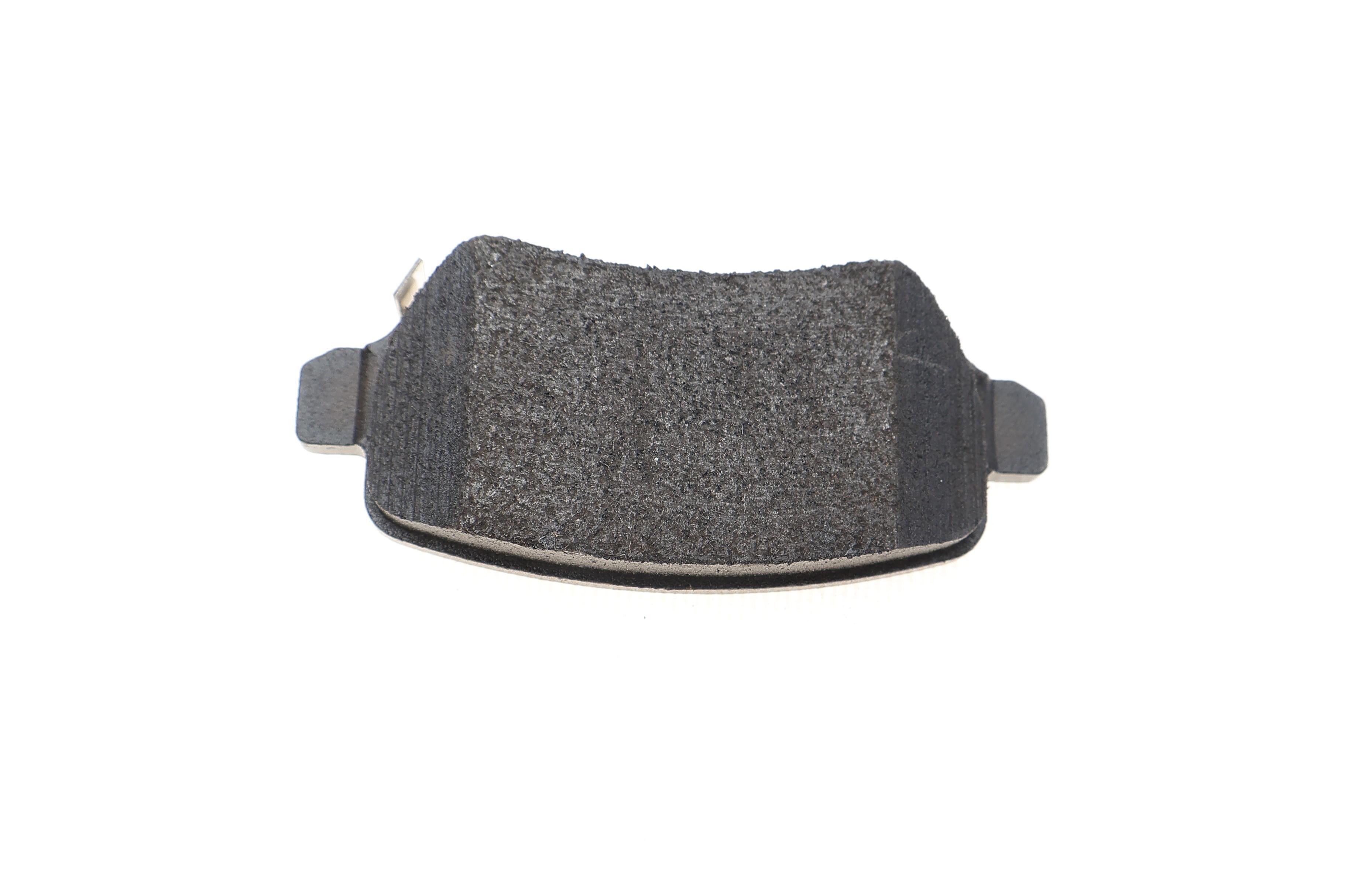 Колодки гальмівні (задні) Opel Astra G/H/ Combo 01- /Kia Venga (Lucas) (з прижимною пластиною)