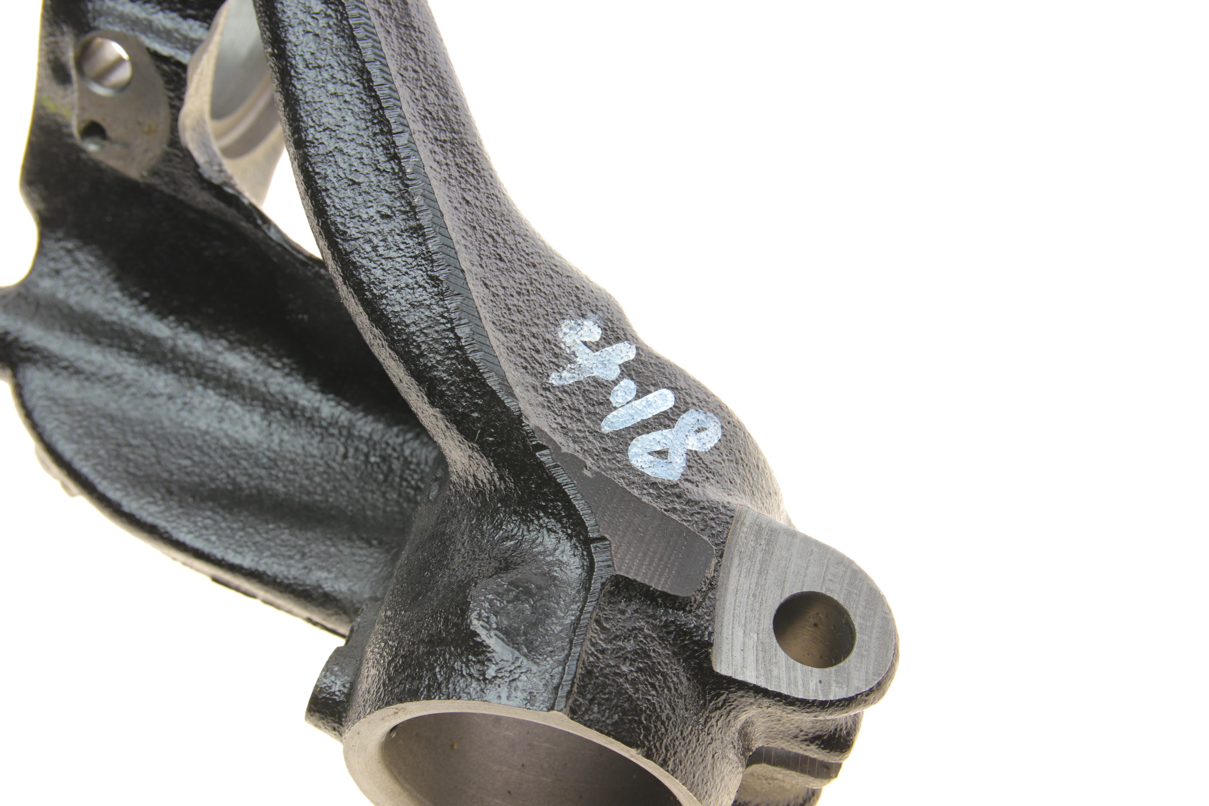 Кулак поворотний (цапфа) VW Golf 14- (R) (OE VAG)