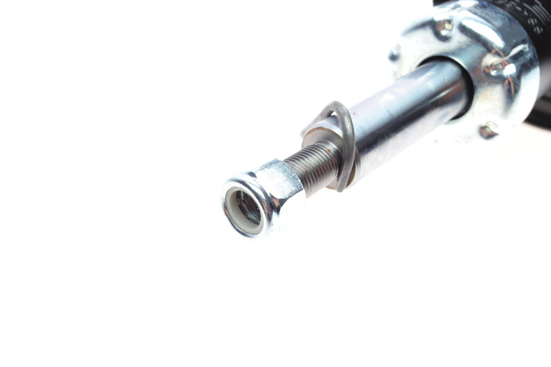 Амортизатор (передній) Nissan Tiida 07- (L)