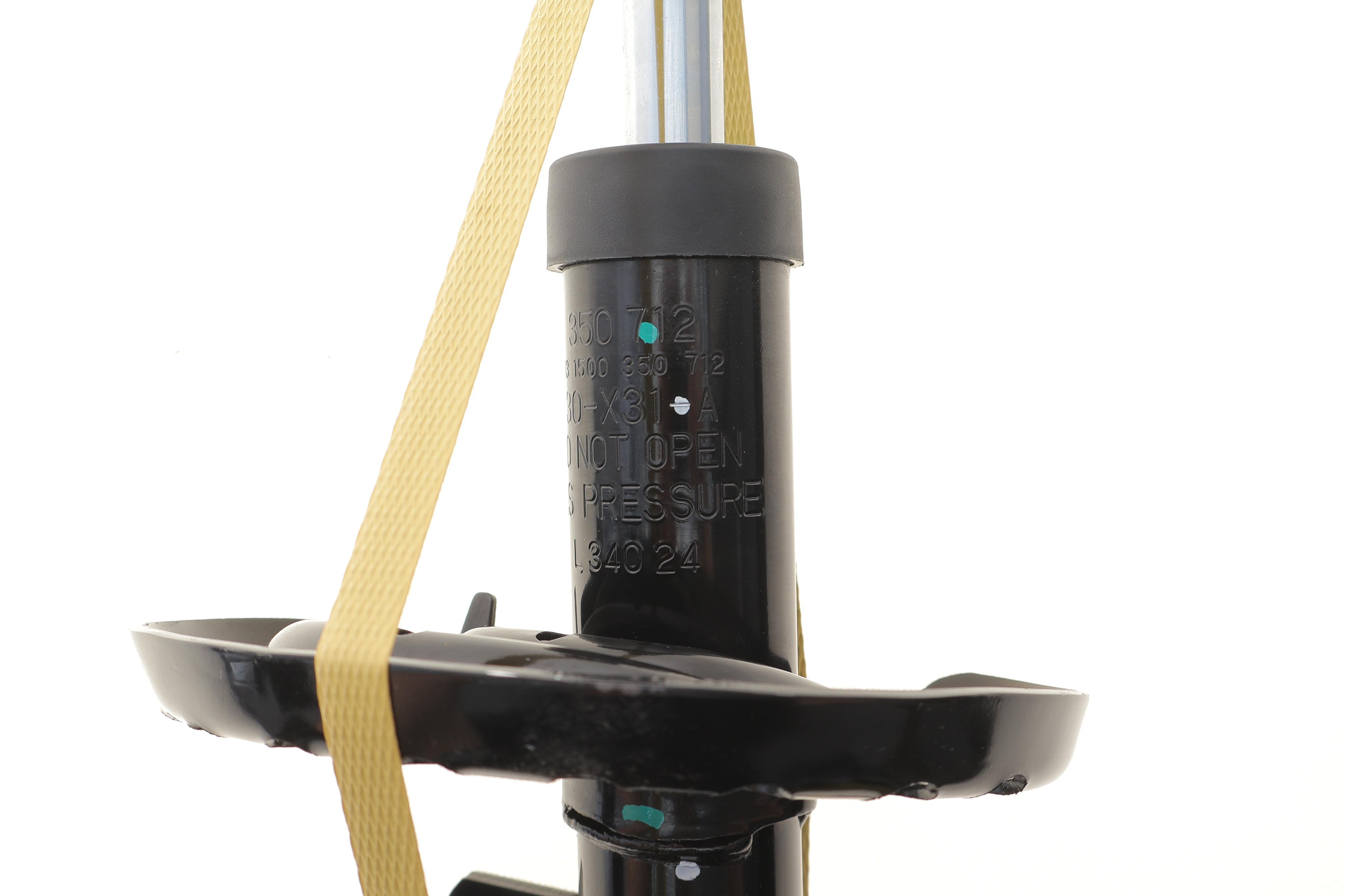 Амортизатор (передній) Nissan Note 06- (R)