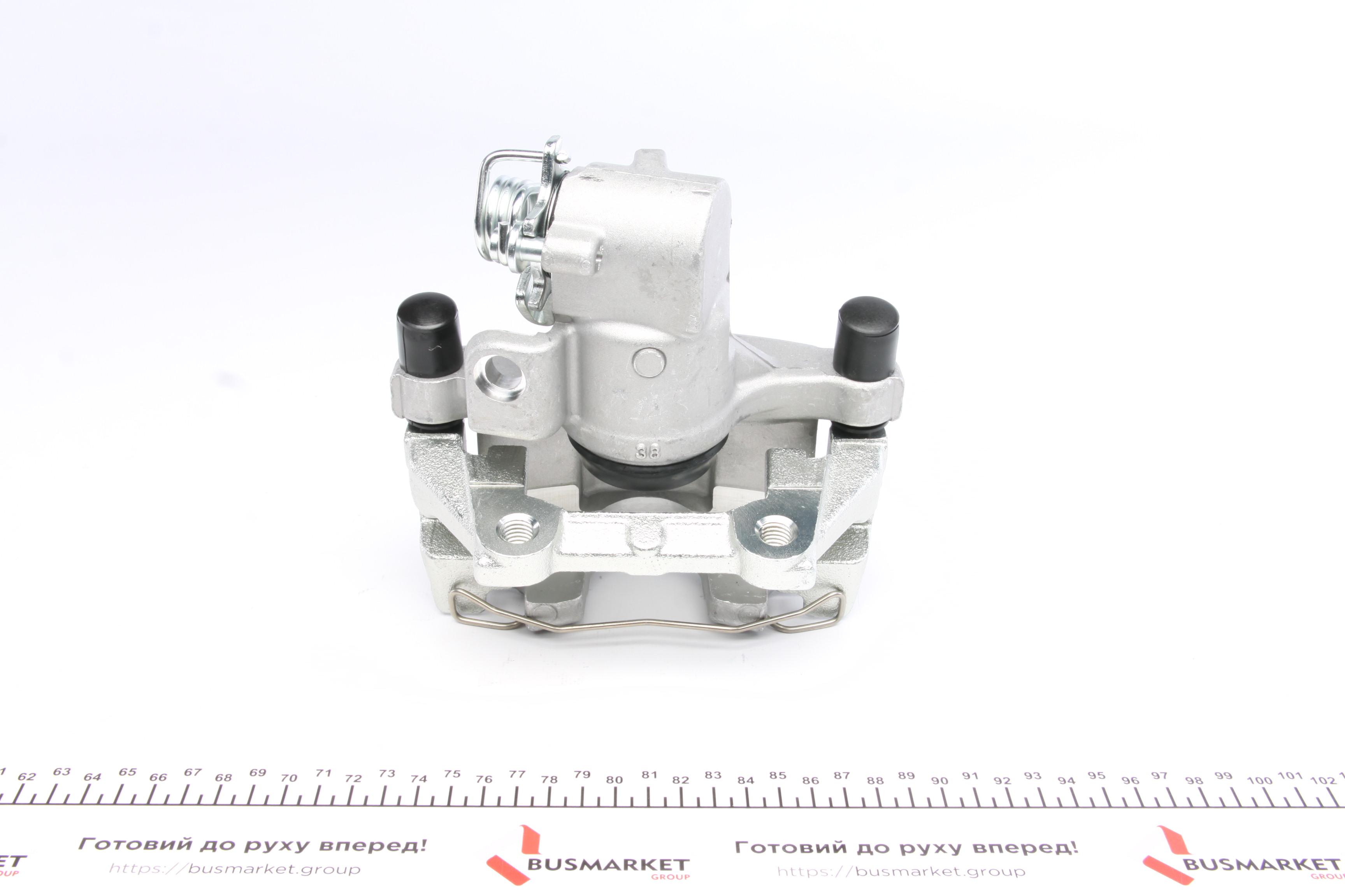 Супорт гальмівний (задній) (R) Ford Transit Connect 02-13 (+скоба)