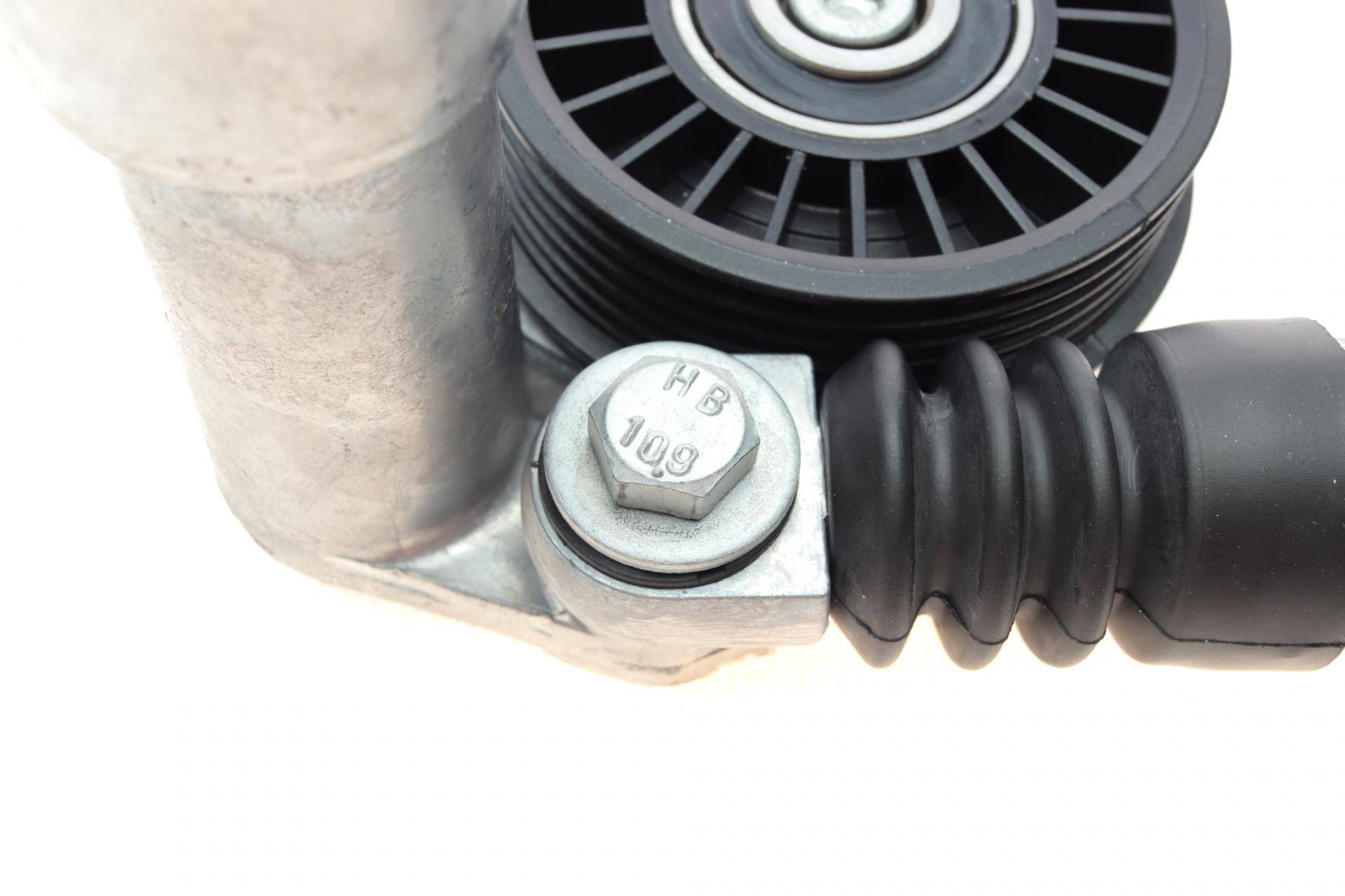 Натяжник ременя генератора Audi A4/A6/VW Passat 1.9/2.0 TDI 98-05