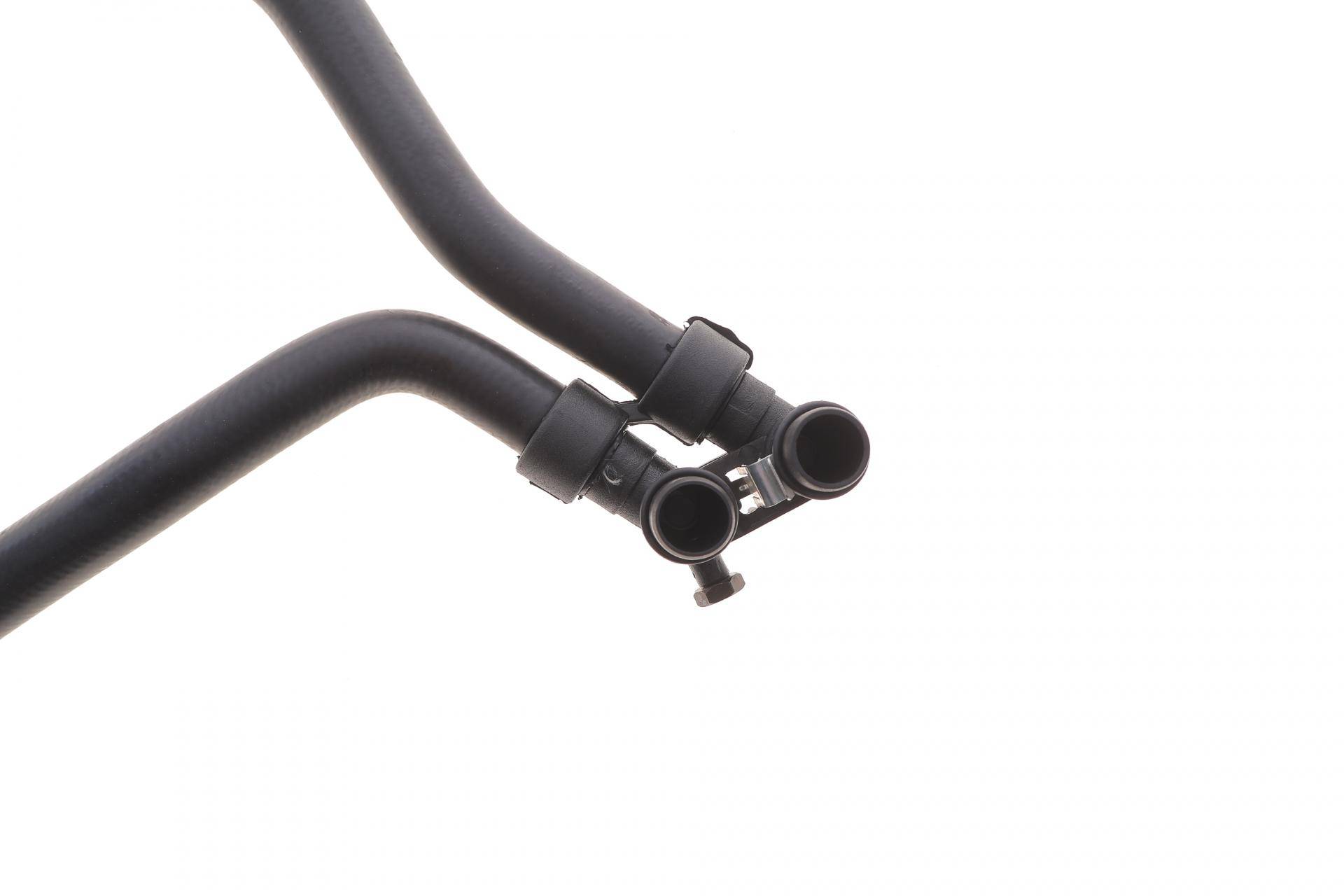 Патрубок радіатора пічки Peugeot Partner/Citroen Berlingo 1.9D 96- (к-кт в зборі)