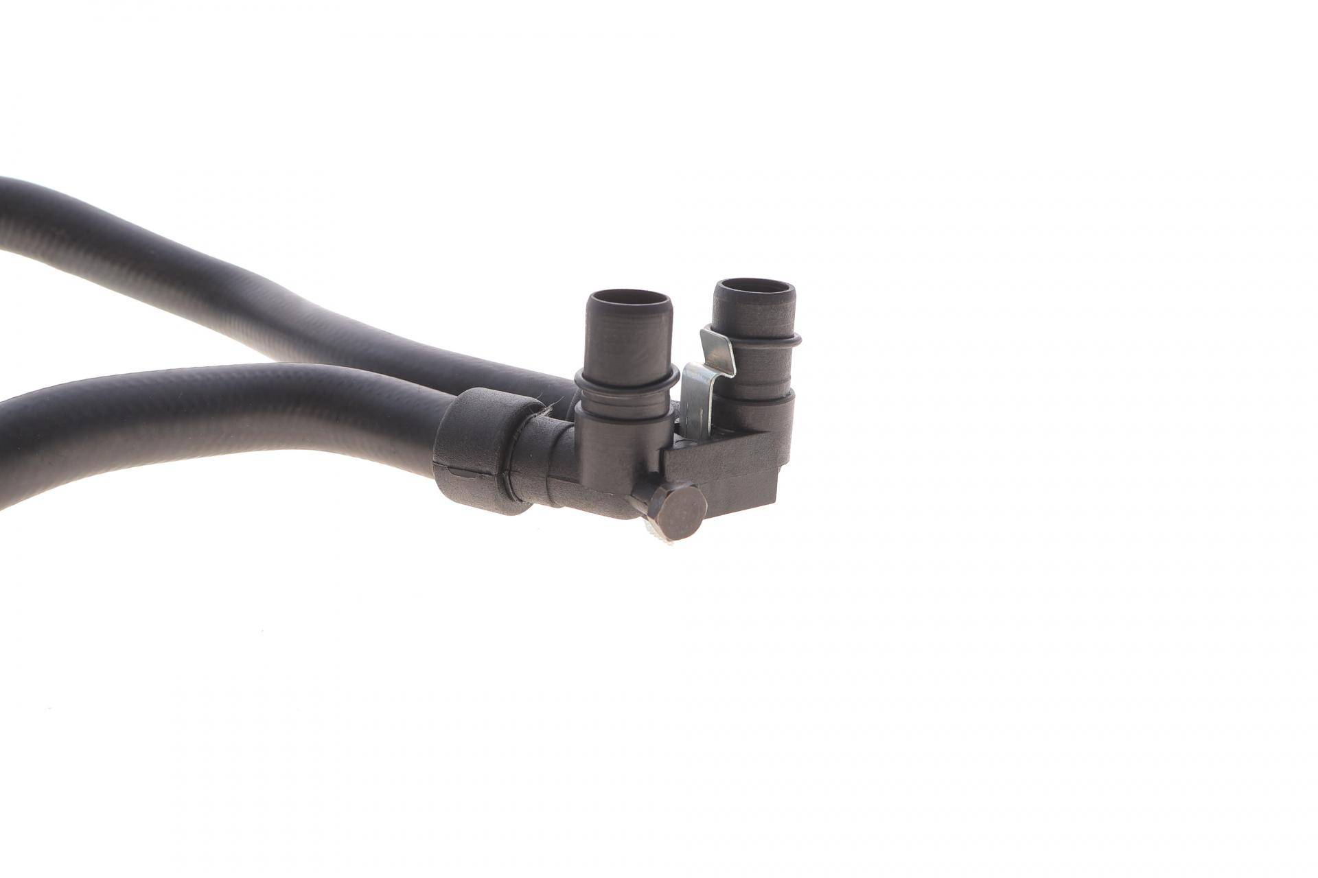 Патрубок радіатора пічки Peugeot Partner/Citroen Berlingo 1.9D 96- (к-кт в зборі)