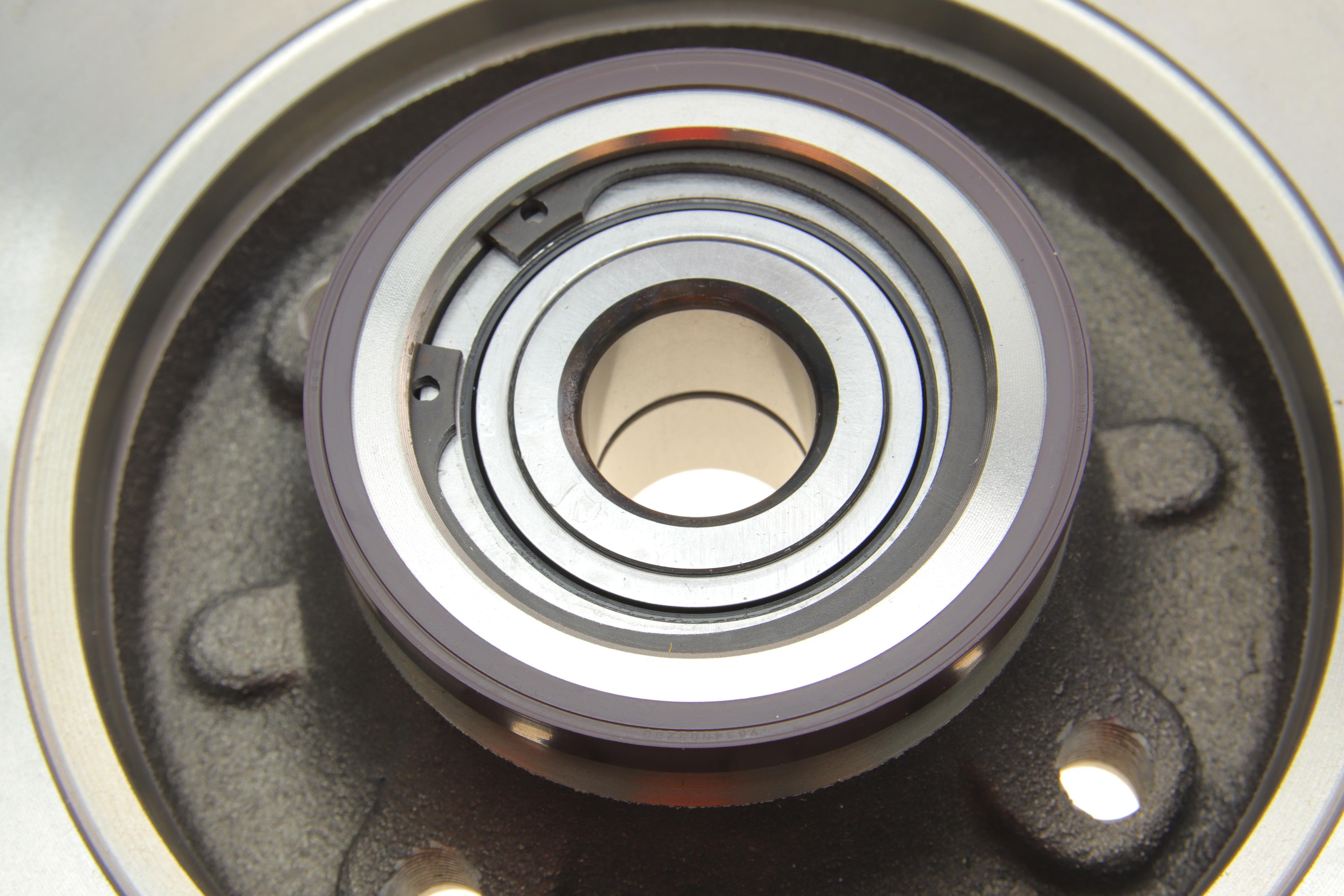 Диск гальмівний (задній) Citroen C4/Peugeot 307 05- (249x9) (+ABS) (з підшипником)