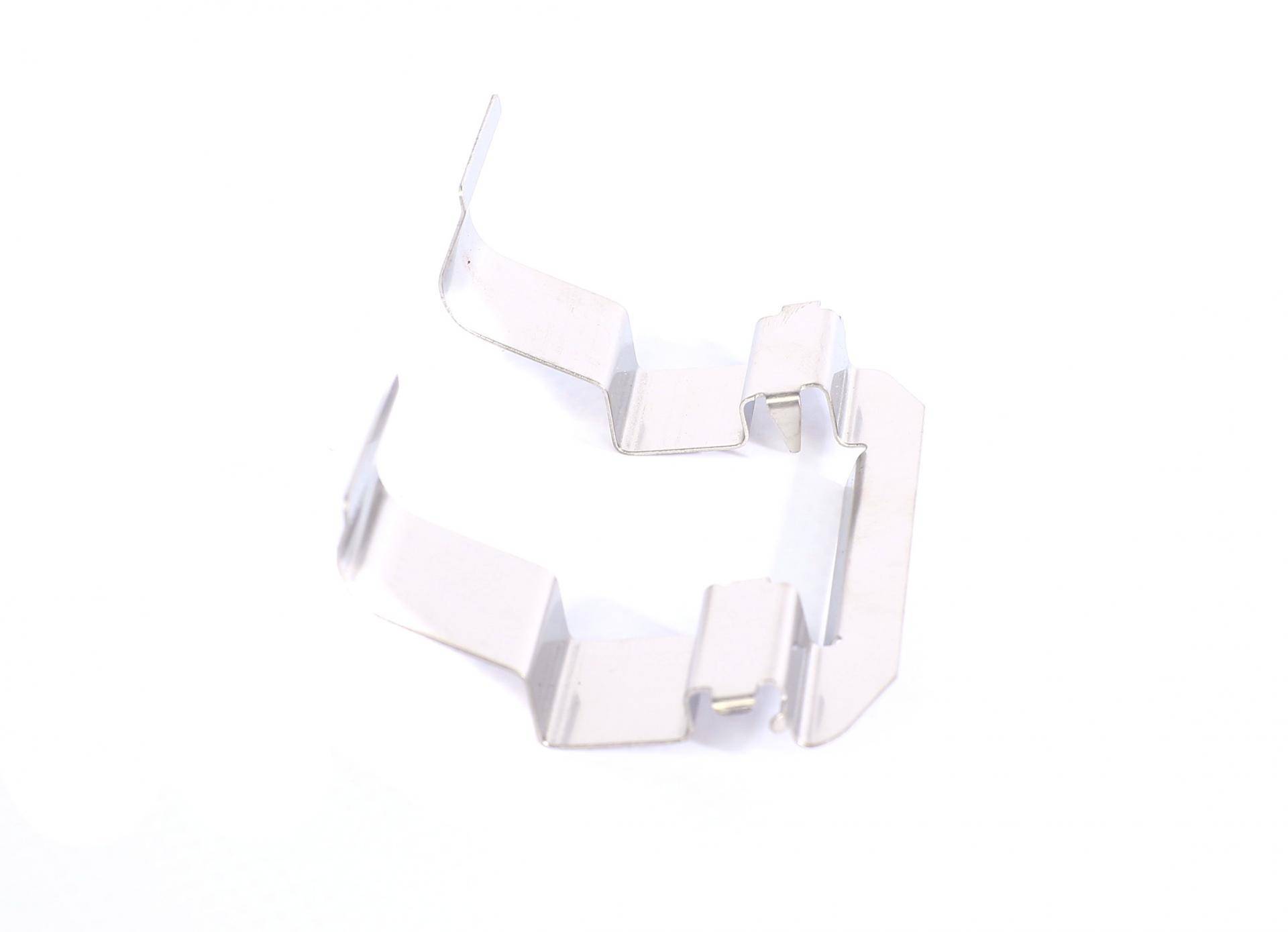 Планка супорта (переднього) прижимна (к-кт) Mazda 323/626 91-02 (Akebono)