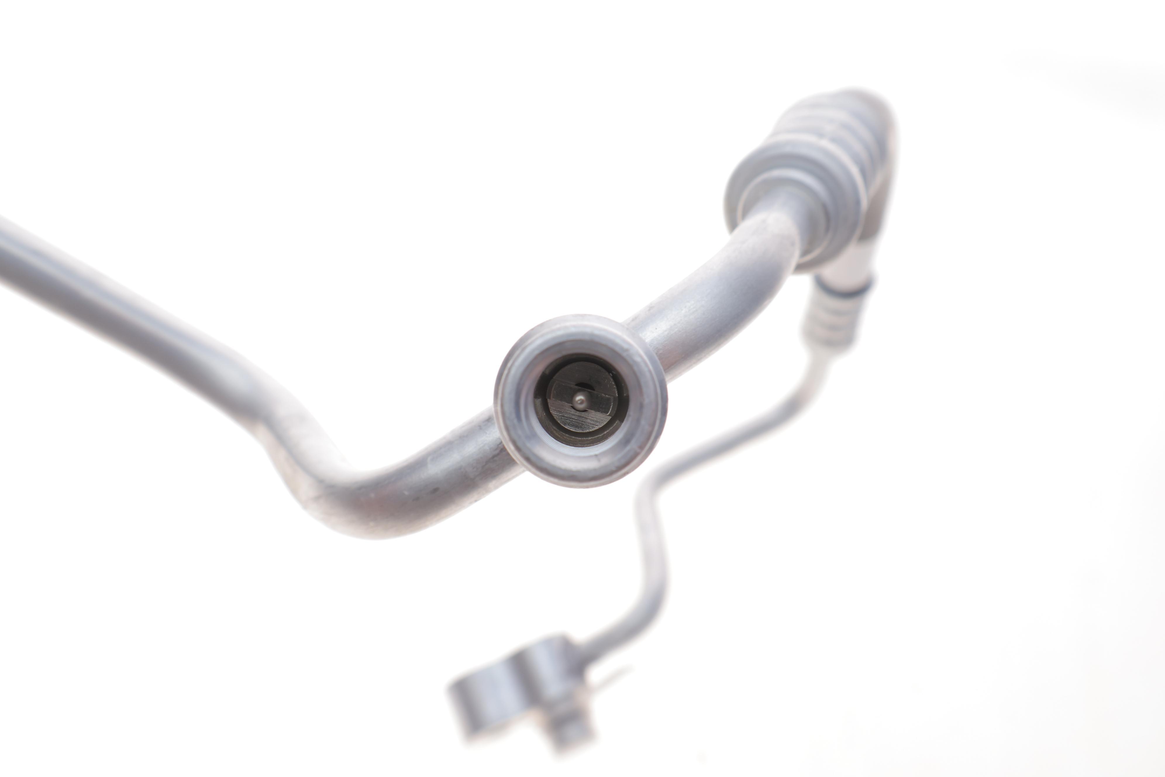 Трубка кондиціонера VW Golf VI/Skoda Superb 1.6/2.0 TDI 08-15