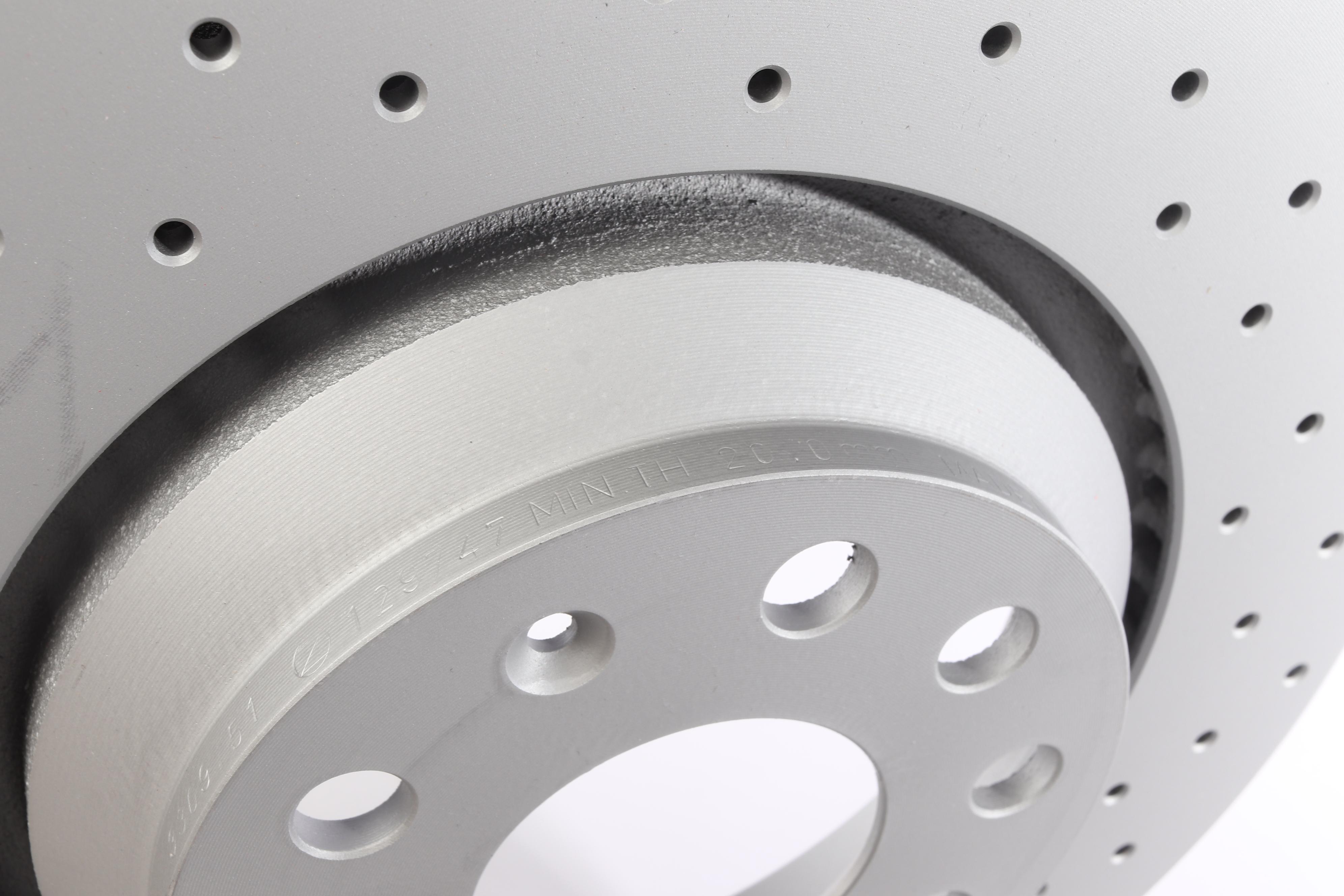 Диск гальмівний (задній) VW Passat 05-/Golf/Seat Leon 12- (310x22) (з покриттям)(з отвором)(повний