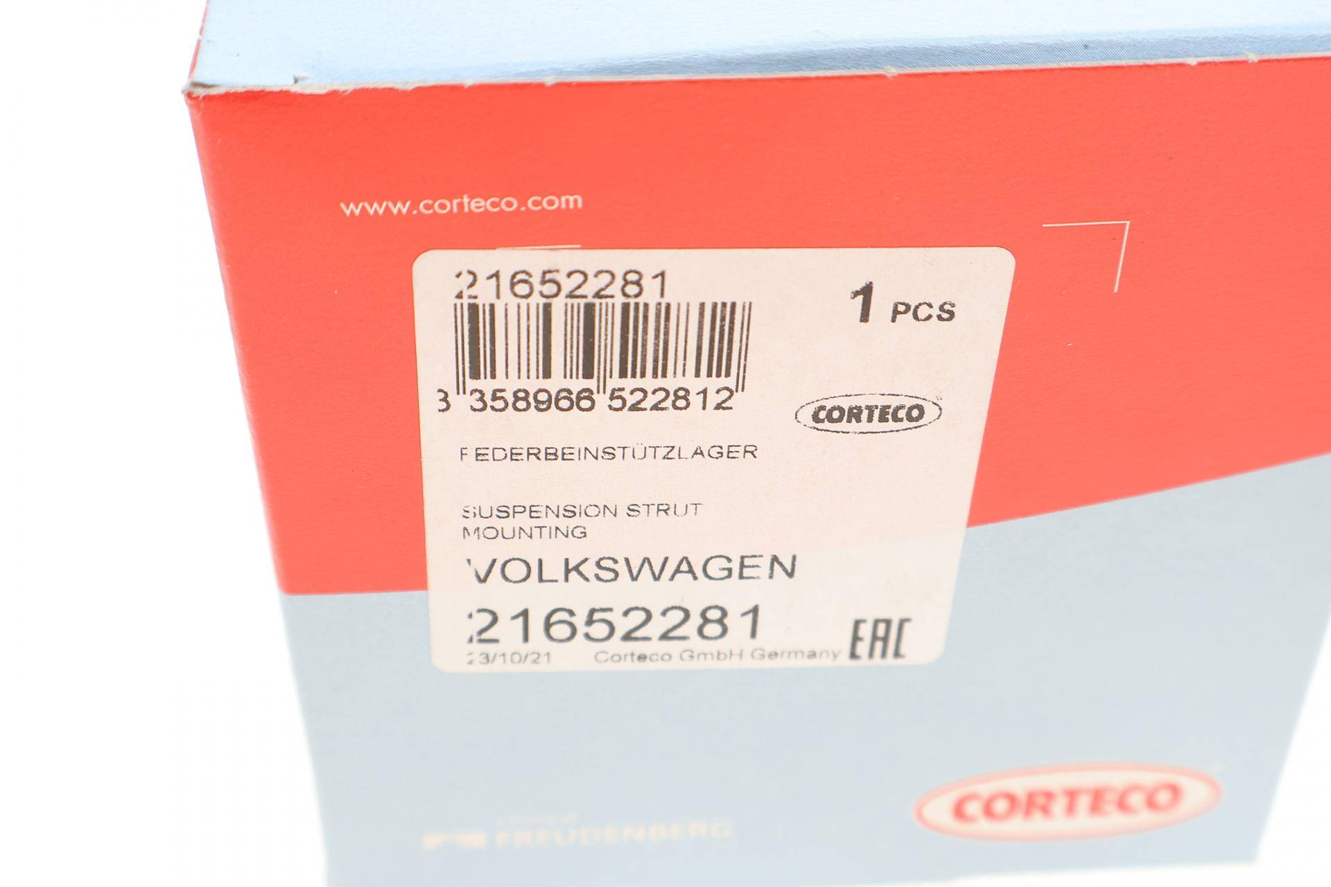 Подушка амортизатора (переднього) VW Caddy II -03