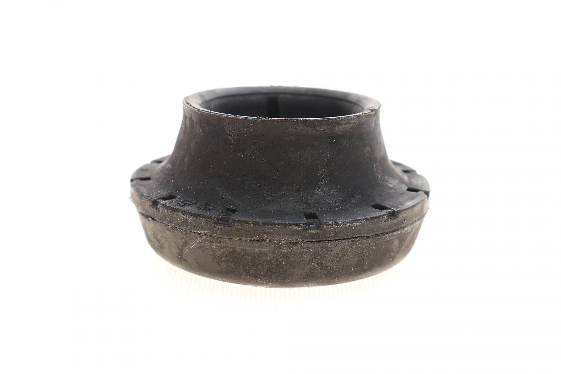 Подушка амортизатора (переднього) VW Caddy II -03