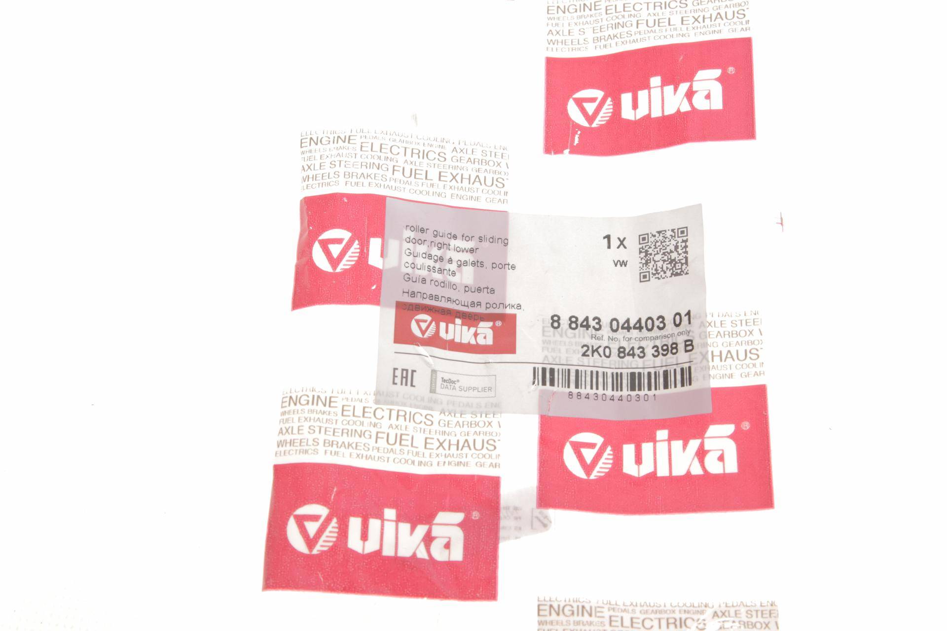 Ролик дверей (бічних/нижній) VW Caddy 03- (R) (з кронштейном)