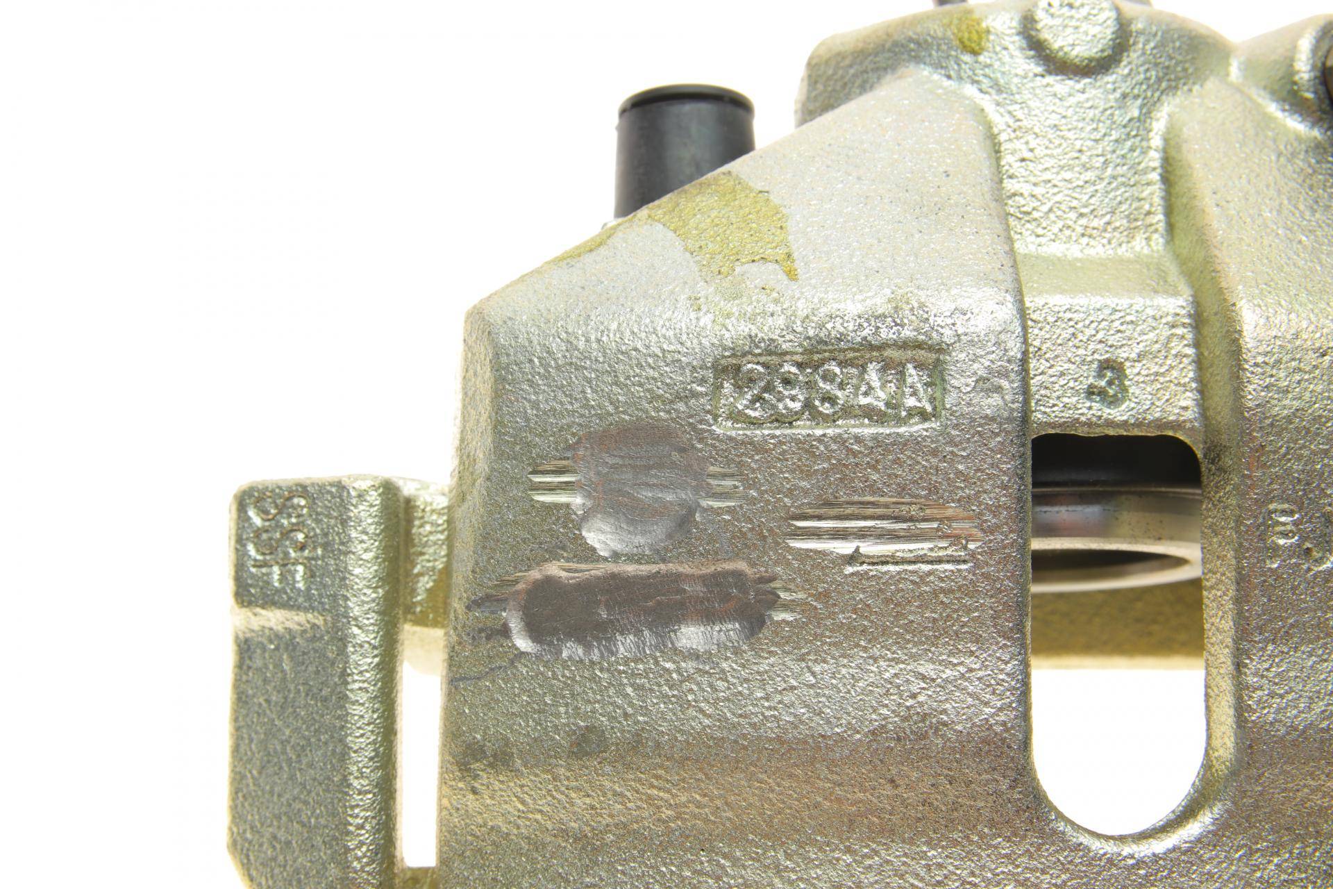 Супорт гальмівний (передній) (L) Audi A1/A3/VW Caddy/Skoda Fabia/Octavia/Superb 04-15 (+ скоба)