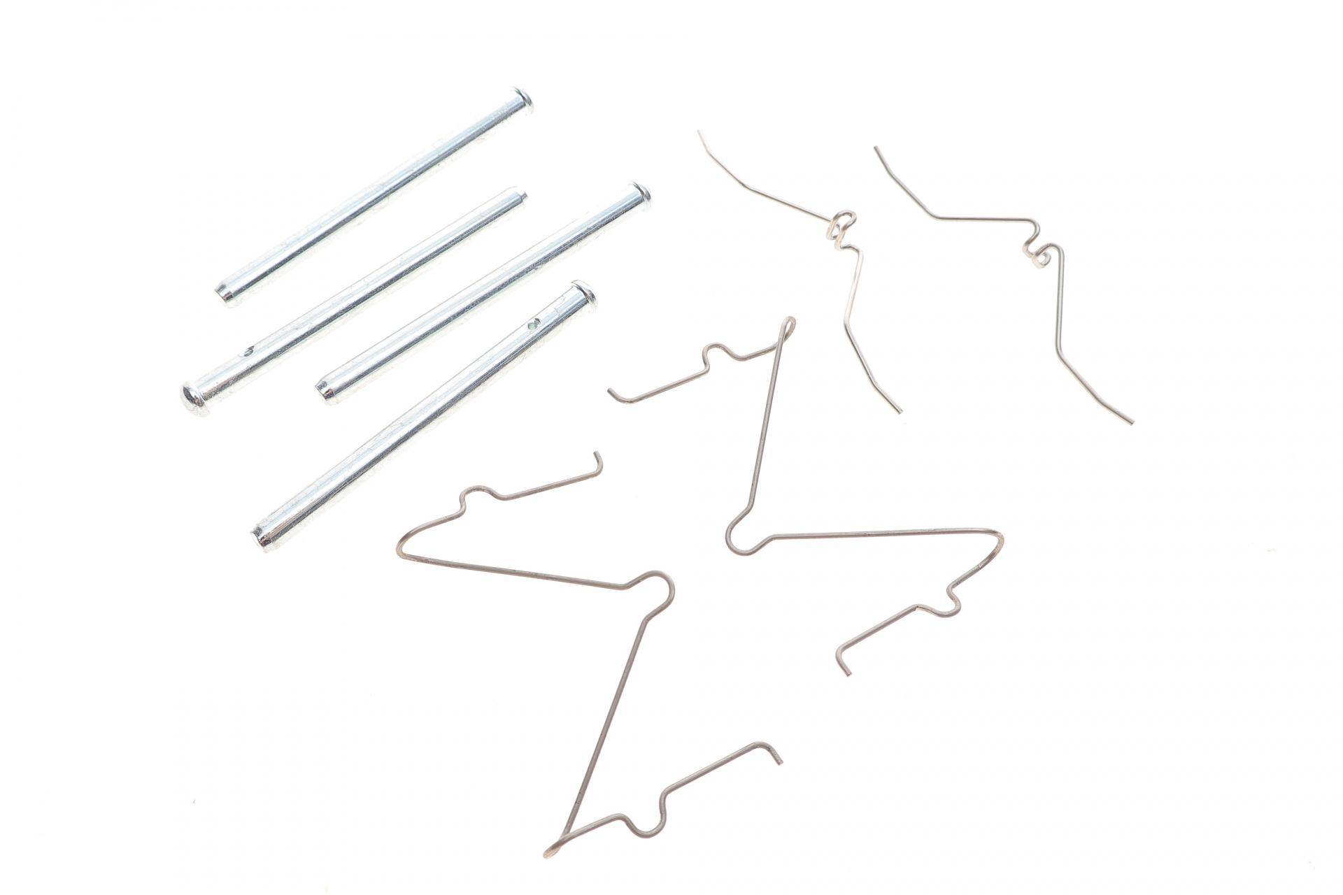 Планка супорта (переднього) прижимна (к-кт) Mazda 121/323 89-94 (Sumitomo)