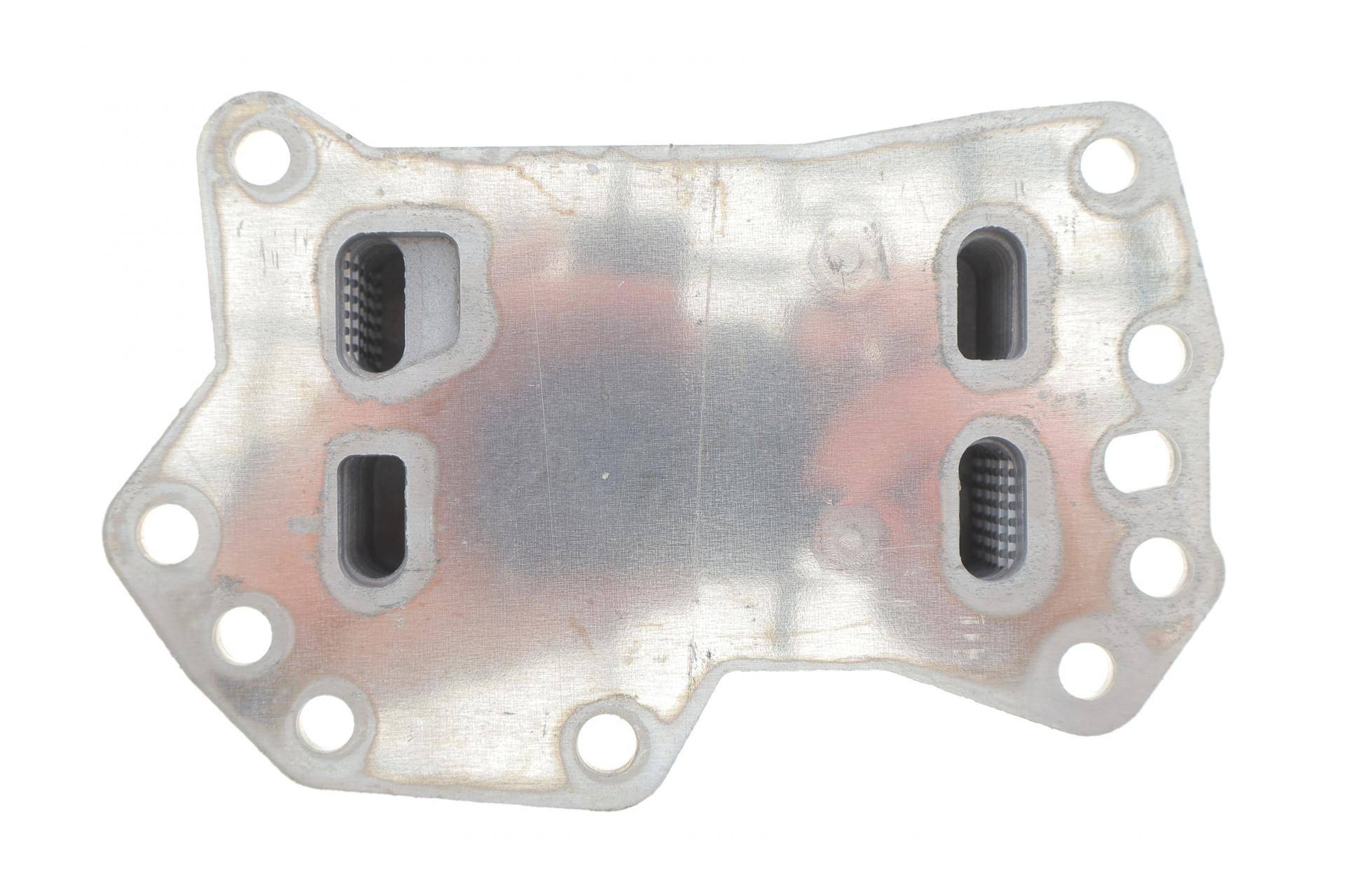 Радіатор масляний Renault Express 1.5 dCi 21- (теплообмінник)