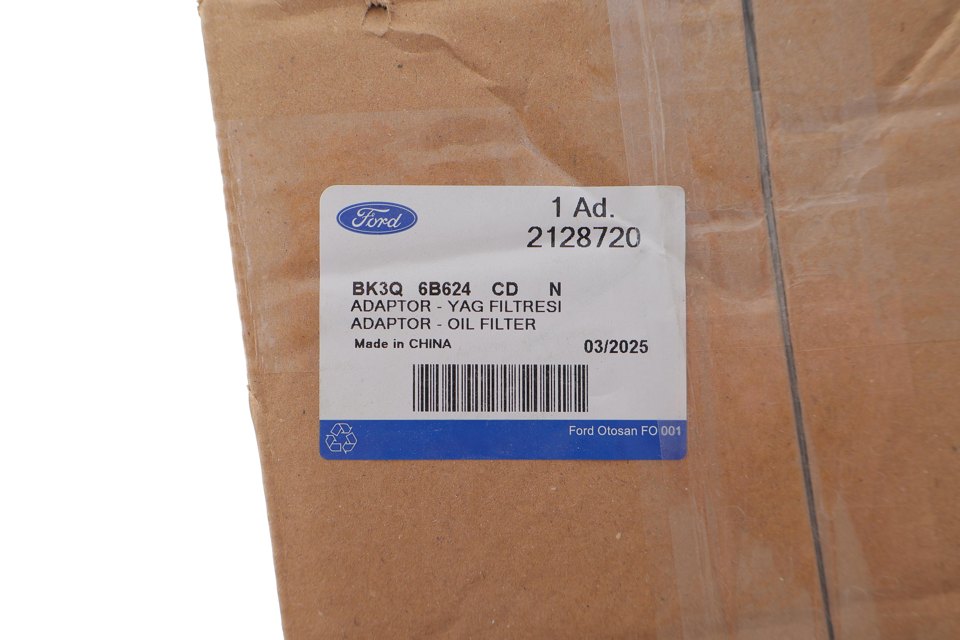 Радіатор масляний (з фільтром) Ford Transit 2.2/2.4 TDCI 06- (теплообмінник)