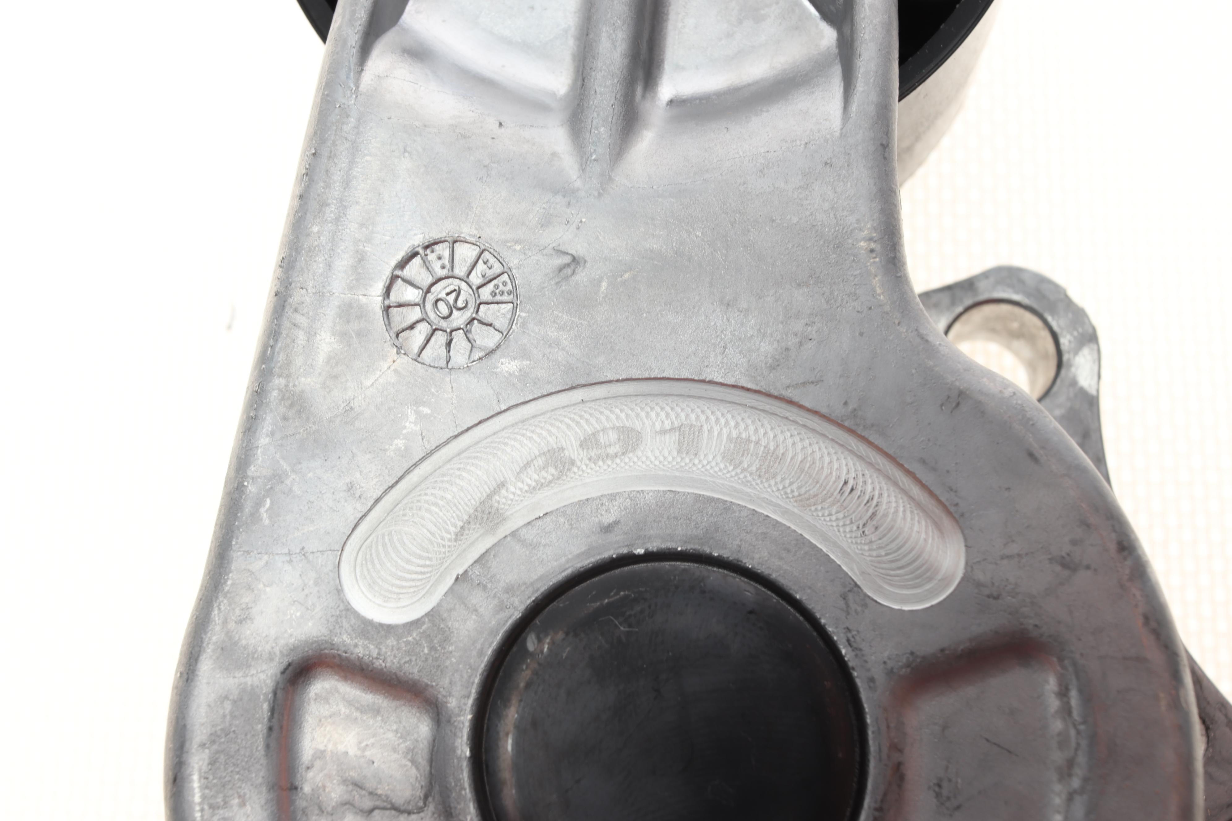 Натяжник ременя генератора Peugeot 2008/208 1.6HDi 12-/Citroen C3 1.4/1.6HDi 09- /C4 Cactus 14-