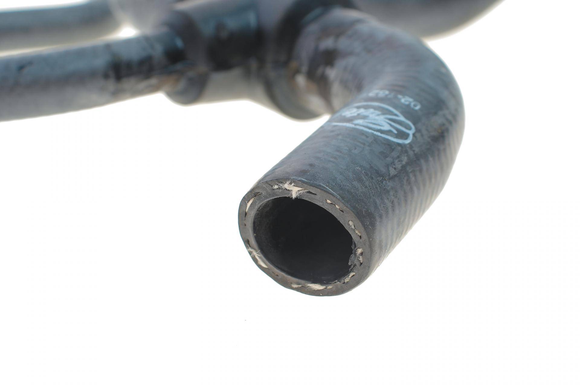 Патрубок системи охолодження Opel Astra G/Zafira A 1.4/1.6 98-09